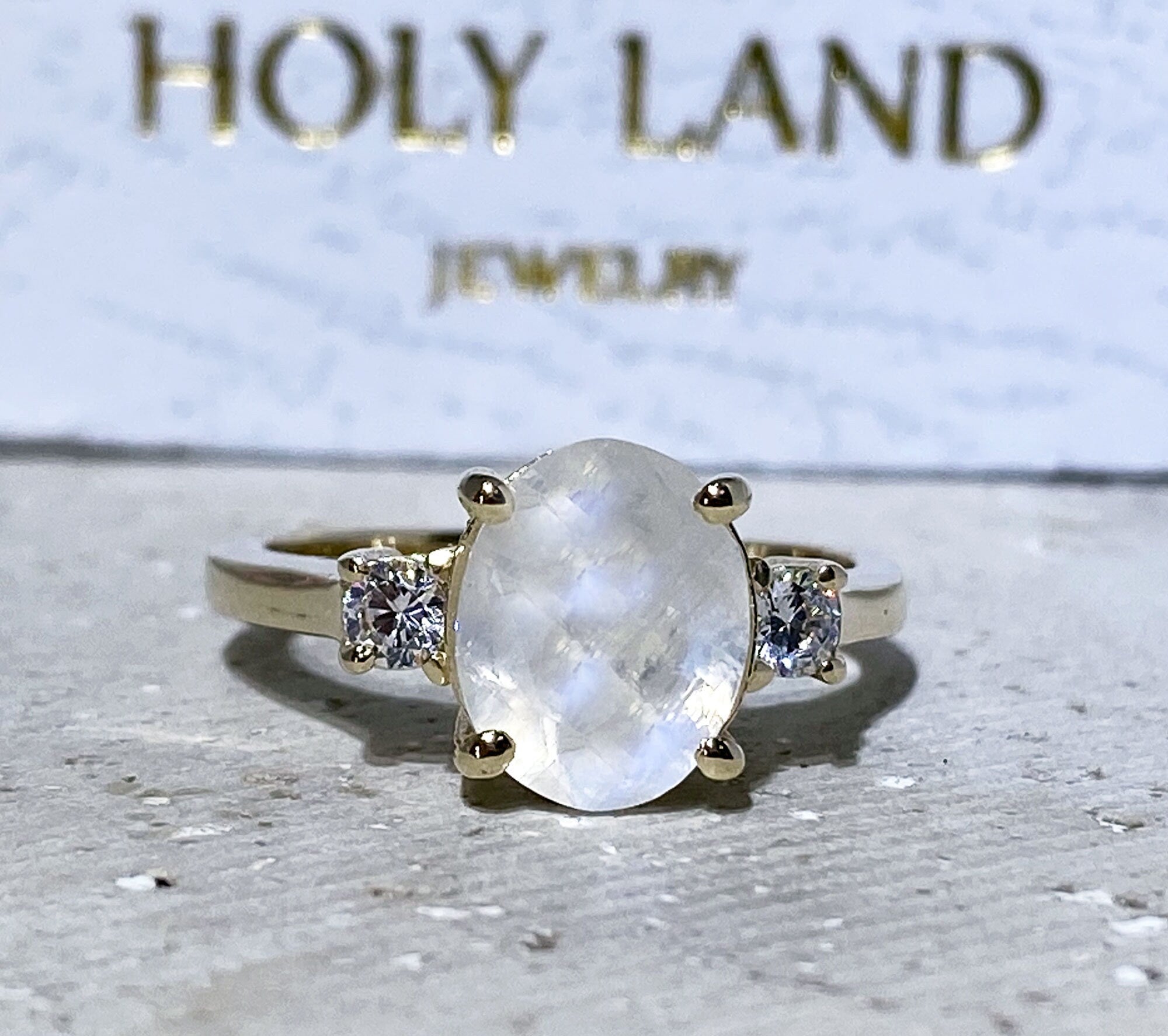 Exquisite, lovely women&#39;s oval cut genuine moonstone ring set with 2 round cut clear quartz.