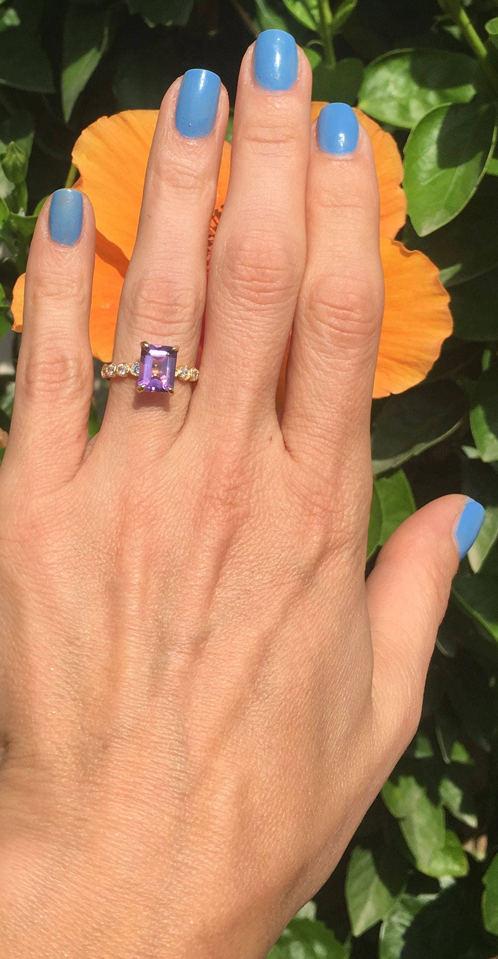 An absolute stunner, classic natural amethyst engagement ring with an emerald cut gemstone of your choice as it’s centre stone and with round cut clear quartz on the band to further accentuate it.Purple Amethyst Ring - February Birthstone - Octagon Purple Amethyst Gemstone Statement Engagement Ring with Clear Quartz Accents