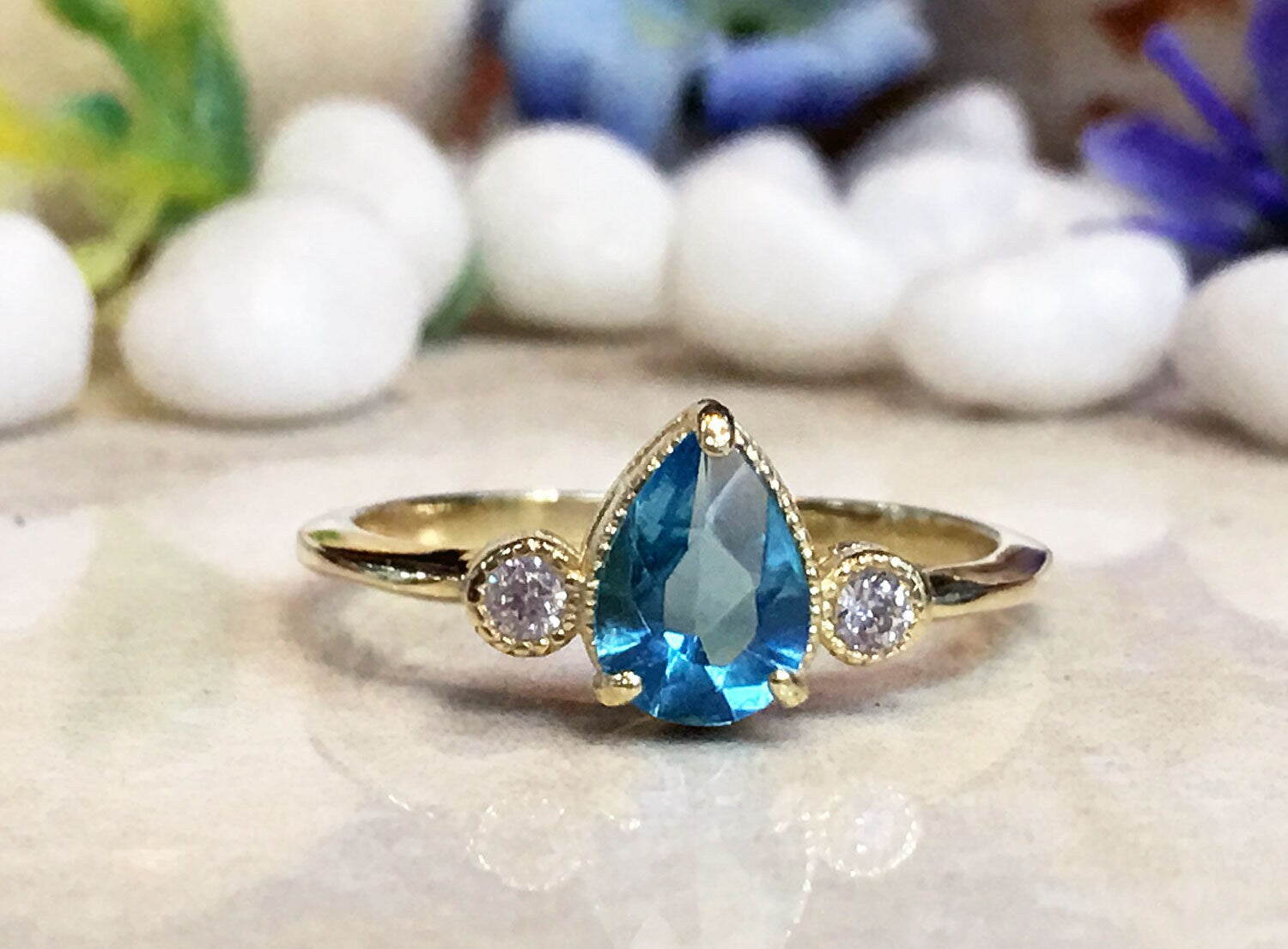 Blue Topaz Ring - December Birthstone - Tiny Delicate Ring with Pear-Shaped Blue Topaz Gemstone and Clear Quartz Accents