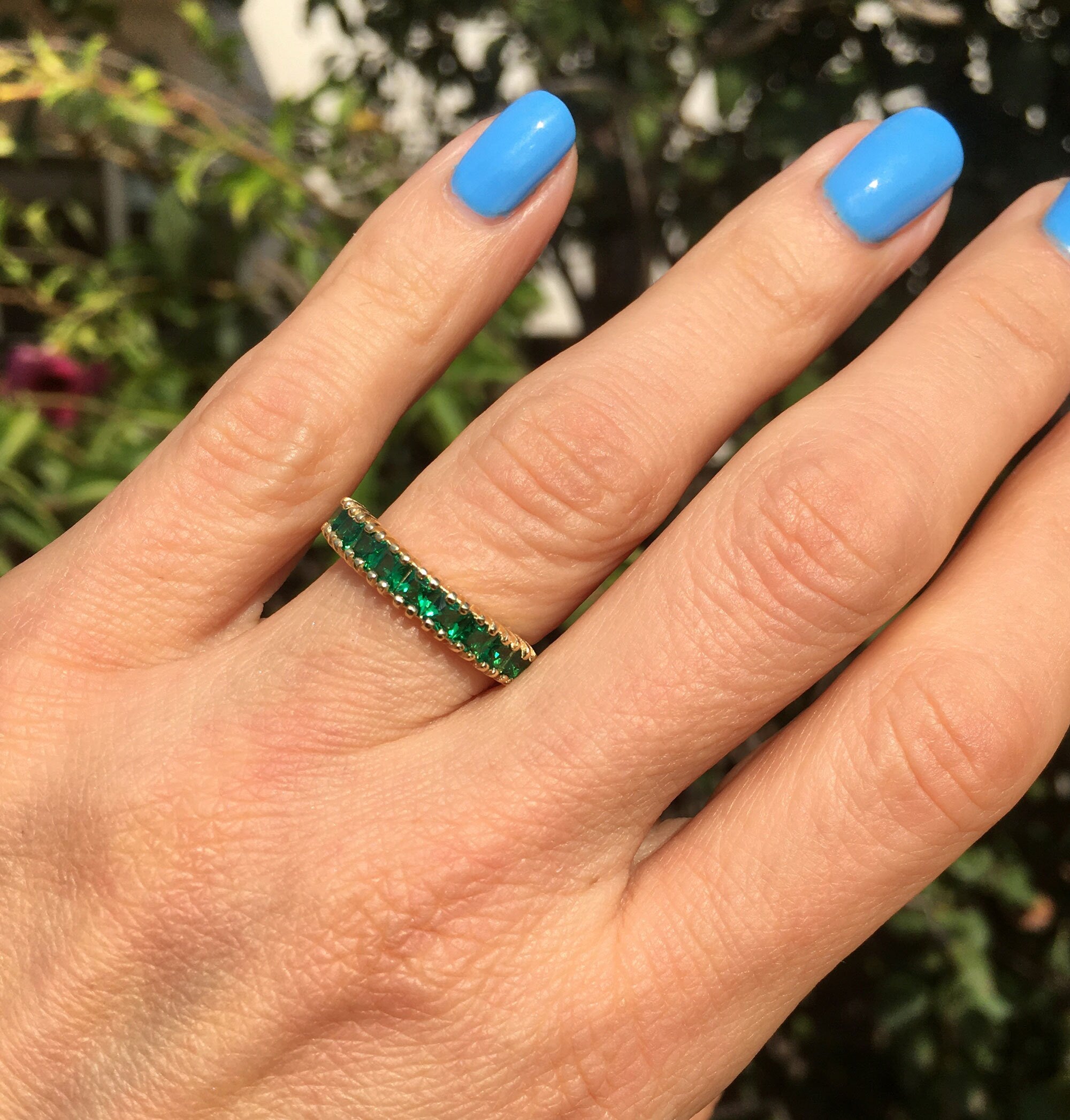 This stylish emerald half eternity ring is beautifully displayed, the fine craftsmanship shows off the row of emeralds, and their stunning sparkle. It&#39;s a beautiful gift ring for anybody who loves gemstones.