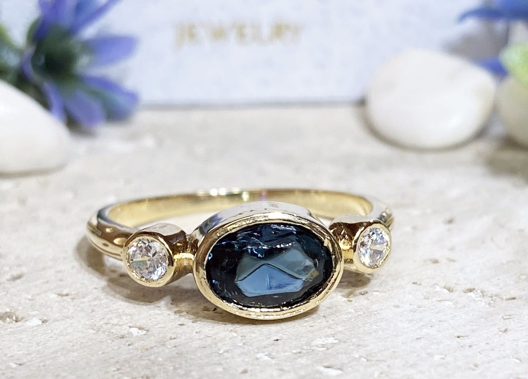 Blue Sapphire Ring - September Birthstone - Bezel Set Ring with Oval Blue Sapphire Gemstone and Clear Quartz Accents