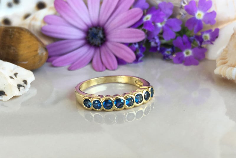 Blue Topaz Ring - December Birthstone - Stacking Ring with Eight Round Blue Topaz Gemstones